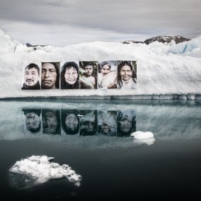 Photos of indigenous people hanging on a glacier in Greenland